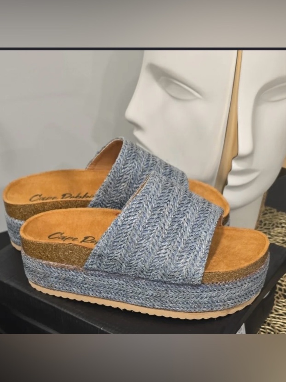 Cape Robbin woven platform slides featuring a textured silver upper
